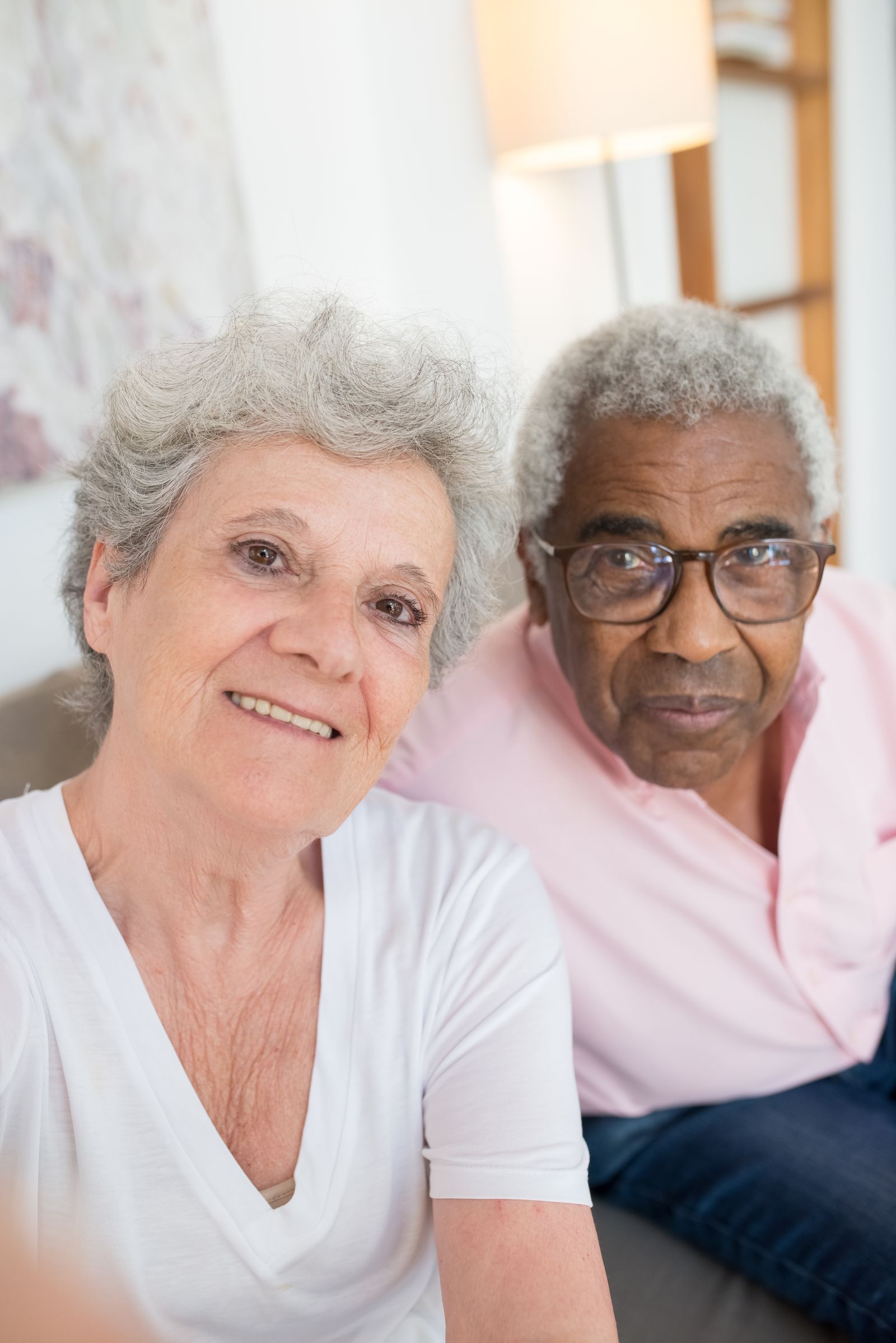 A happy senior couple relaxing together at home